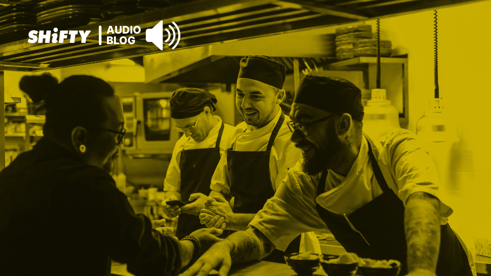 restaurant cooks interacting with server