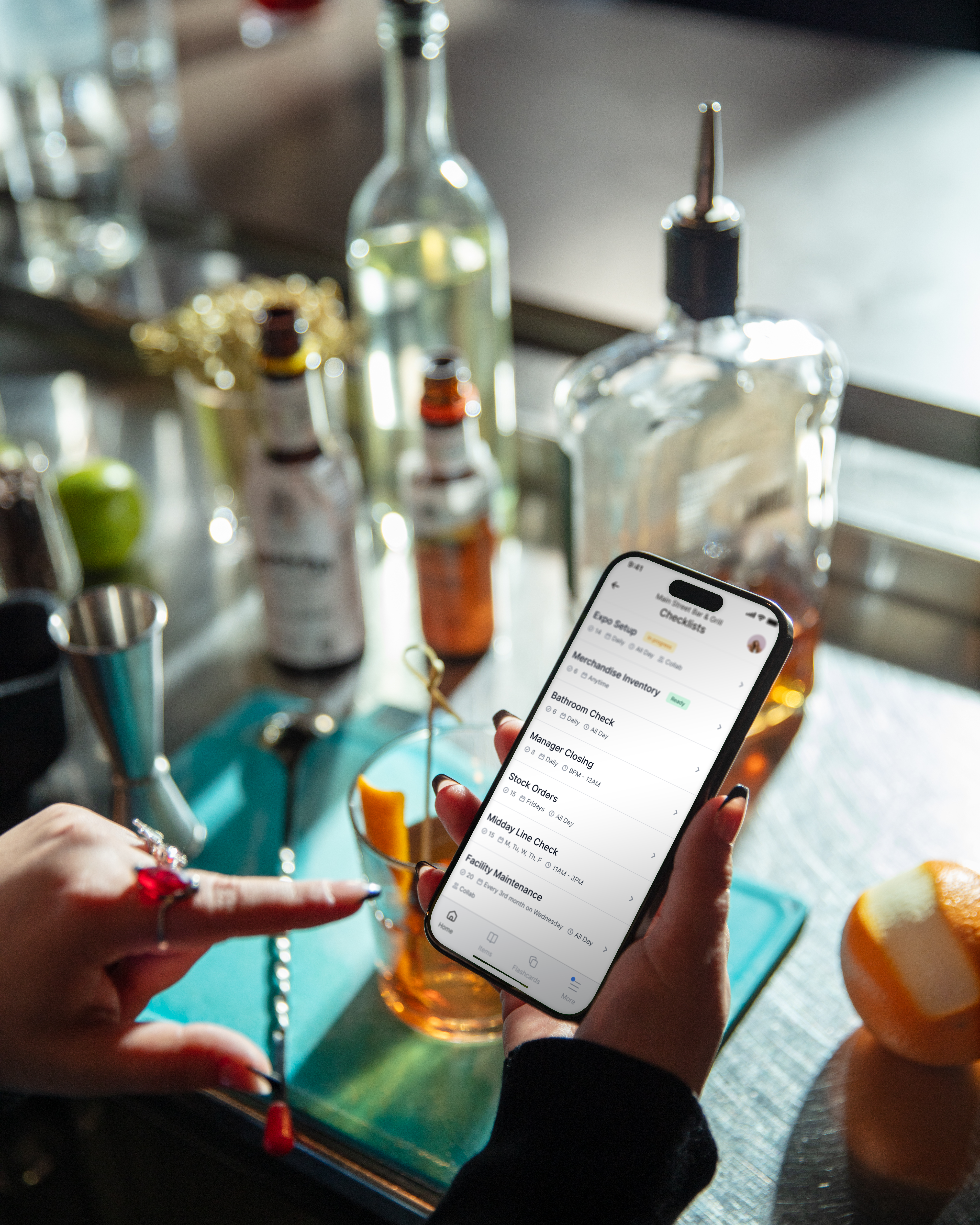 phone scrolling with cocktail measurements on it